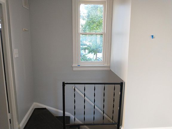Living area opposite view showing entry into your new home