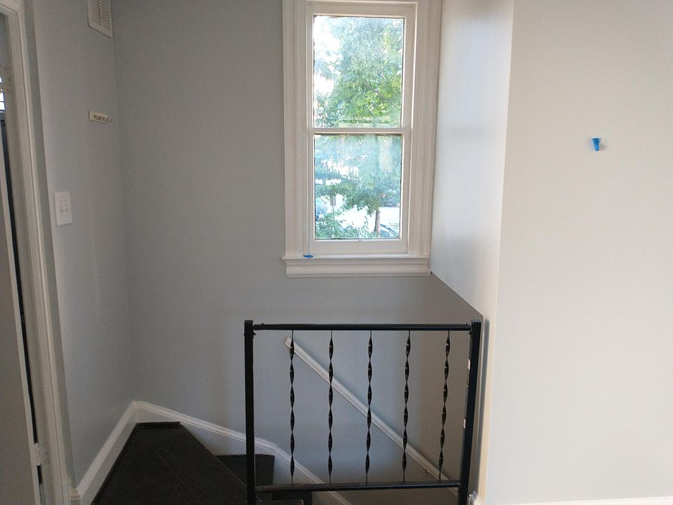 Living area opposite view showing entry into your new home