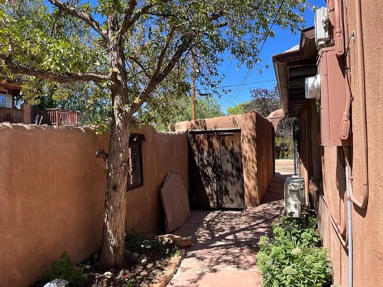 Second access to the kitchen from the West courtyard.