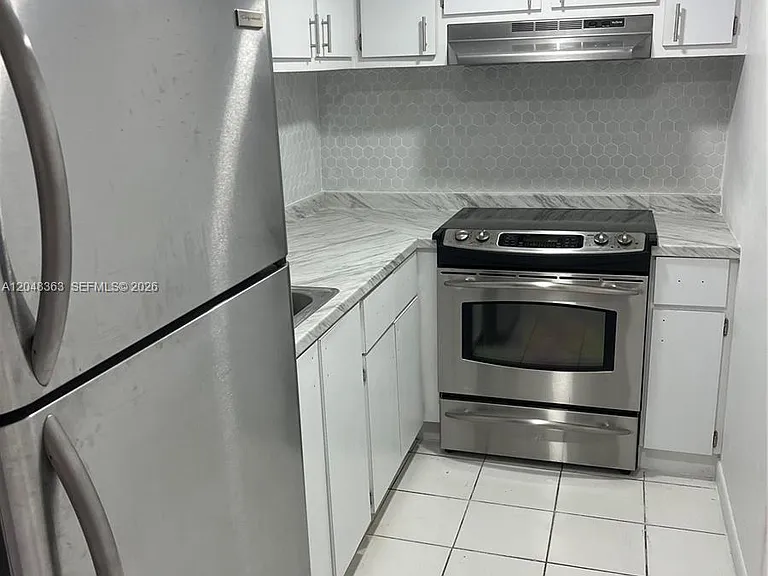 4715 NW 7th St #407-2 — Photo 4