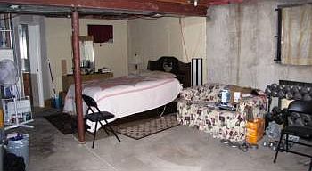 Basement set up as a bedroom