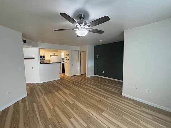 Living room to Dining and Kitchen