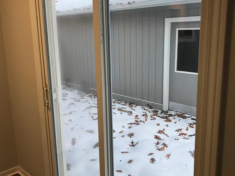 Master Bedroom with sliding glass door to patio.