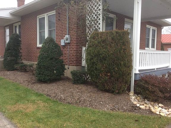 Side of home with side porch