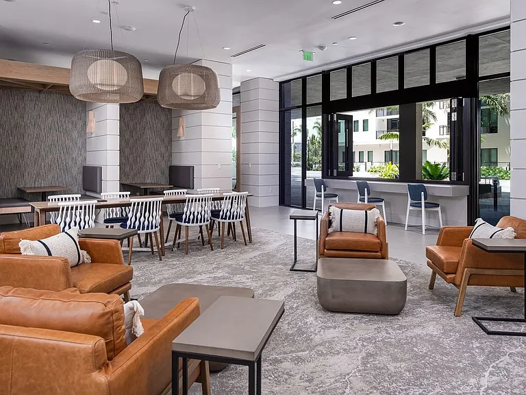 Resident lounge with common area seating and work from home areas