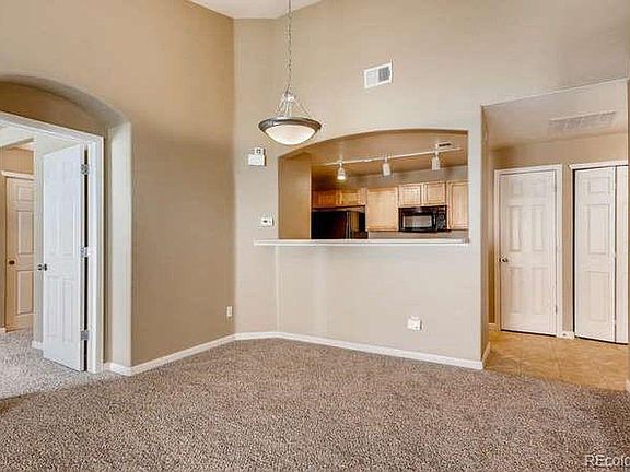 View of dining area and kitchen. You can also see pantry and