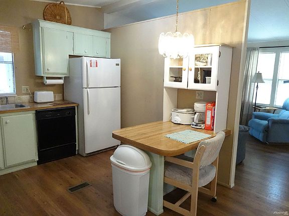 Side door leads into the Kitchen