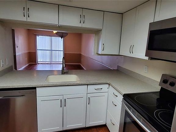 4th image of 5030 Terrace Palms Cir Unit 202
