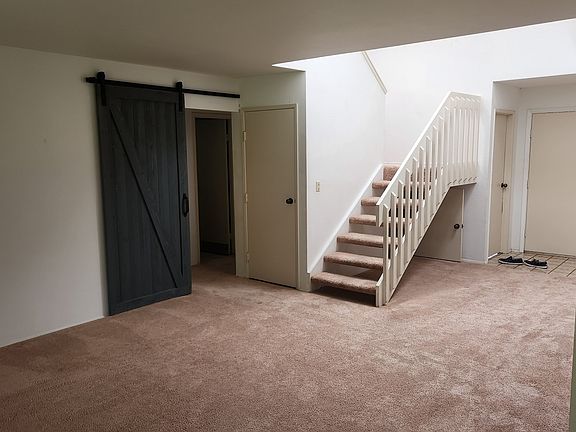 ENTRY TO DOWNSTAIRS BEDROOMS AND BATH