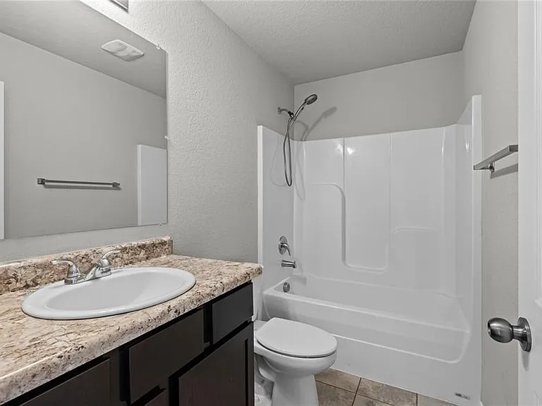 313 Woodcreek St — Photo 12