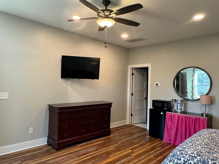 dresser, mini-refrigerator, microwave, and coffee pot