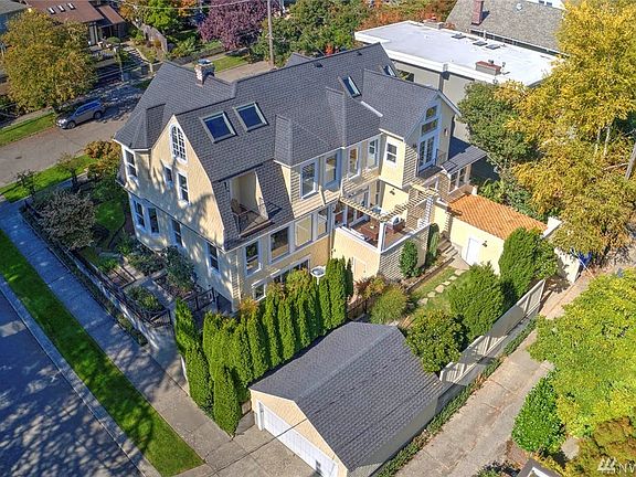 Impeccable view of grounds and all 4 levels of this elegant colonial estate in Madrona. 