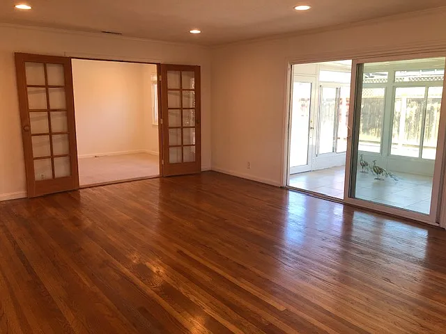 Another living room view to bedroom #4/office and sun room, fresh wall paint