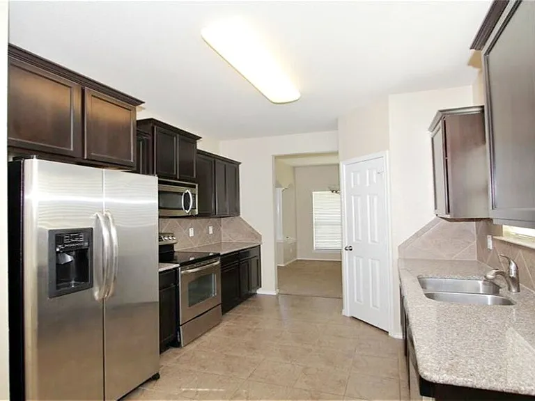 Kitchen toward formal dining room