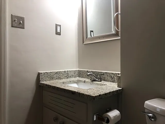 bathroom sink with granite