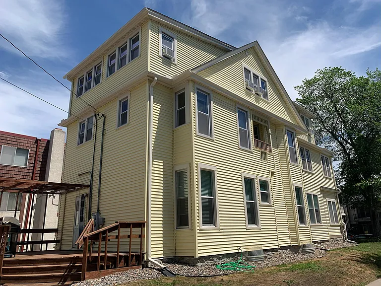 Grand property built by renowned Minneapolis architect and builder T.P. Healy, "King of the Queen Anne," with new roof and exterior, with great deck for entertaining