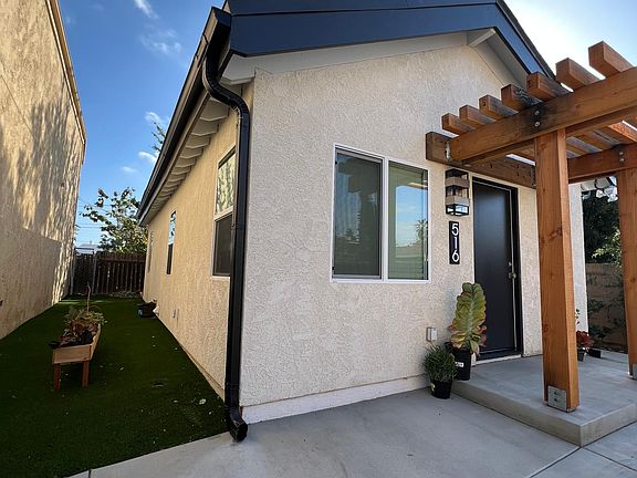 Turf grass on one side of home