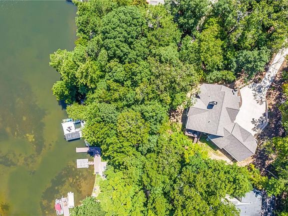 Image 4: Aerial View Shows Private Wooded Lot