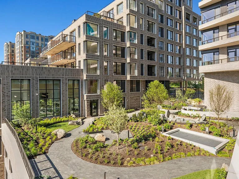 Live nestled among lush landscaping