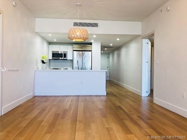 1st image of 9940 W Bay Harbor Dr #5B