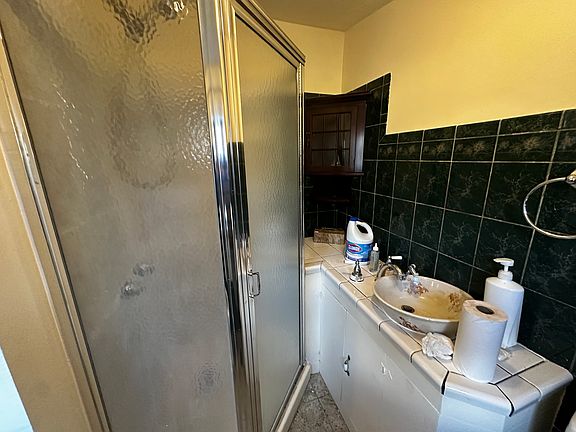 Downstairs bath with stand up shower , right next to 1 st floor bedroom "master" bath is small but cute