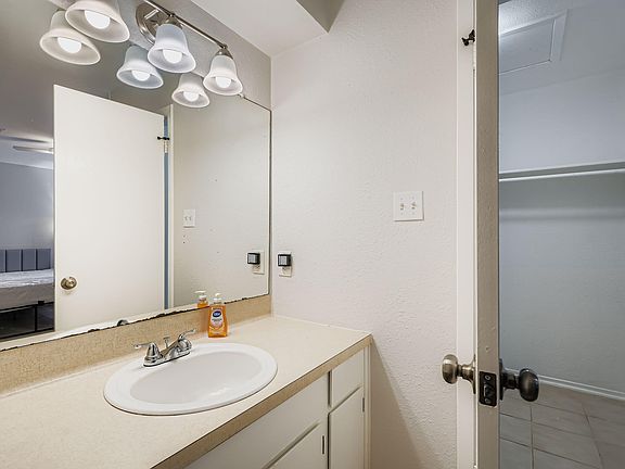 Private sink area and massive walk-in closet