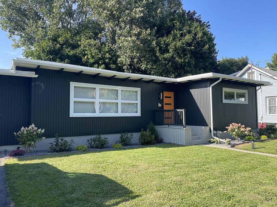 Front of the home from curb. The pride in ownership shows from the crisp painting to the beautiful landscaping and the stainless finishing touches.