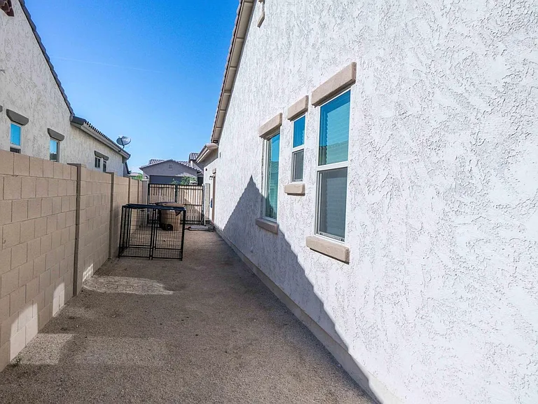 9775 W Rowel Rd — Photo 33
