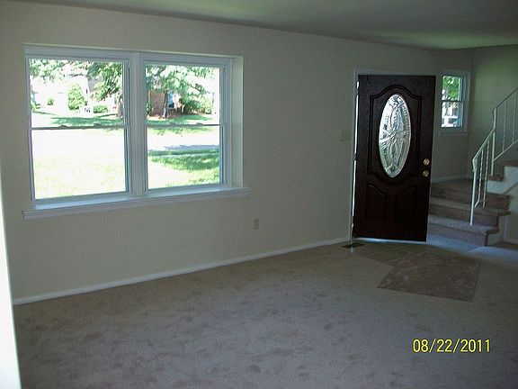 Entry, living room, new carpeting