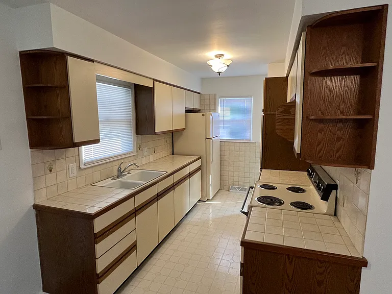 Lots of cabinet space in this kitchen. New stove March 2026 not pictured here