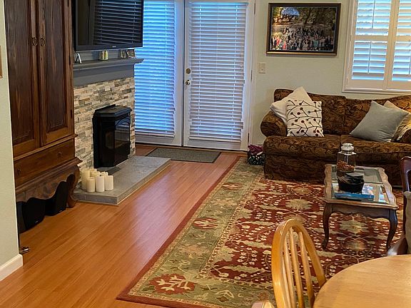 New fireplace with pellet stove insert. New shutters on windows, upgraded recessed lighting, molding and paint