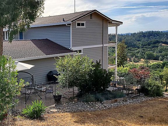 home - horse trail on right 