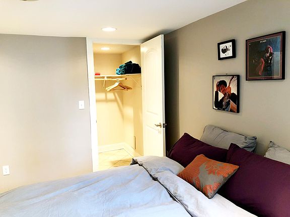 Bedroom with walk-in closet