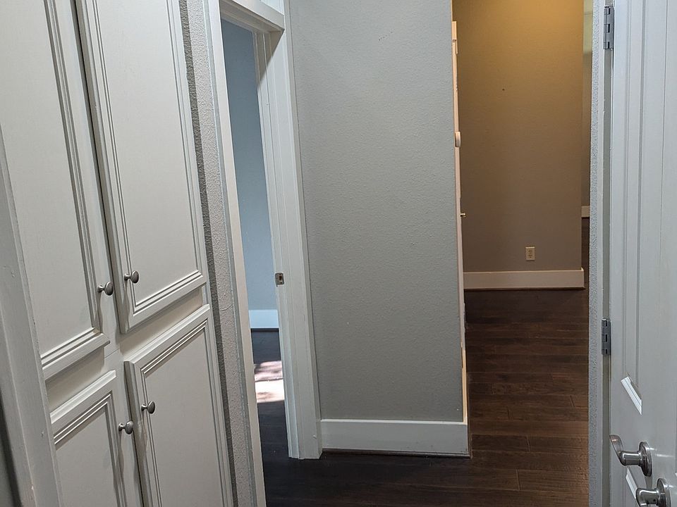 Coat closet, linen built in cabinets, in-unit washer and dryer, transoms.