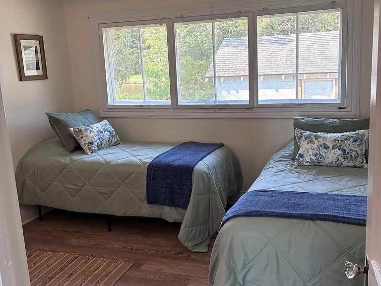 Bedroom #2 accommodates two single beds or one king-sized bed