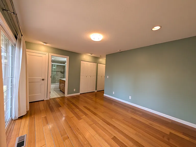 Master bedroom facing entrance.