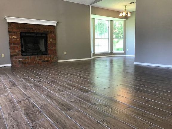 Brand new floors throughout! wood look tile, beautiful, and 