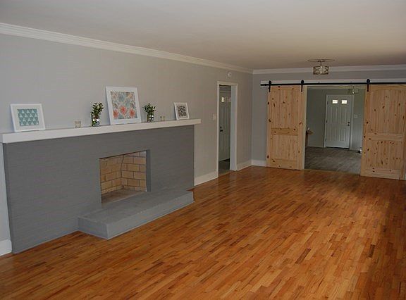 large brick FP in huge family room