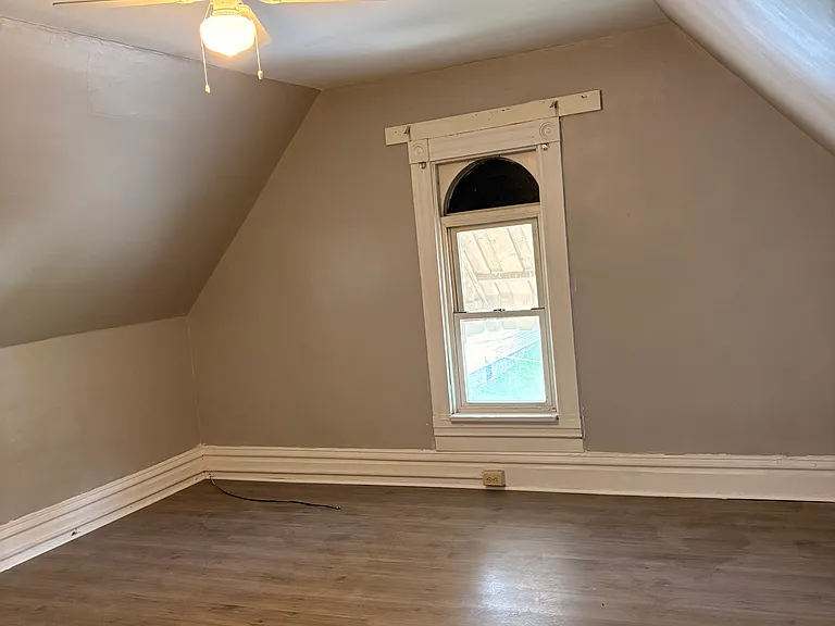 Bedroom 3 -Third story bedroom with ceiling fan and baseboard controlled heating