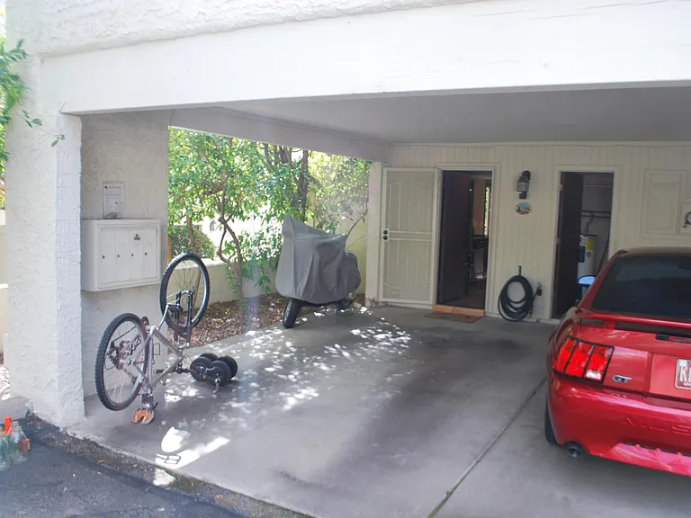 One Covered Parking Spot, One Street Spot