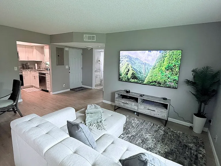 1566 SE Royal Green Cir #V203 — Photo 1