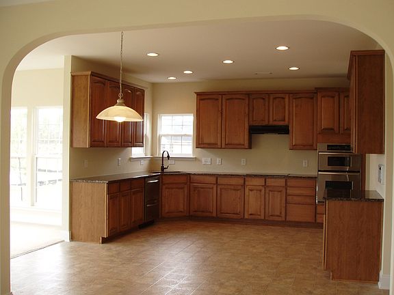 Open Kitchen w Granite countertop & maple cabinet