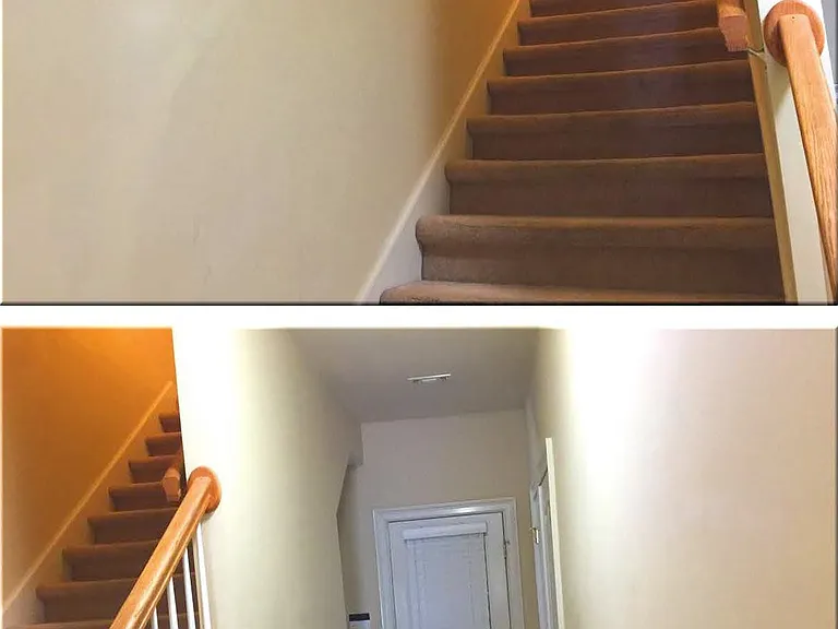 Stairs to Bonus Room and entrance Door to Garage.