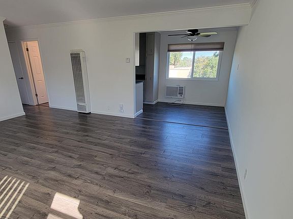 View of Living Room and Dining Area from front door