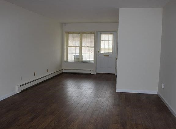 Sun filled unit.  Living room and dining room.