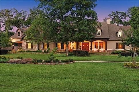 Sprawling 1.5 story ranch-style home on 1.1 acres.