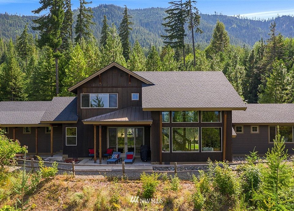 Welcome to 200 Snow Ridge Drive, where the rugged outdoors and luxury living merge!