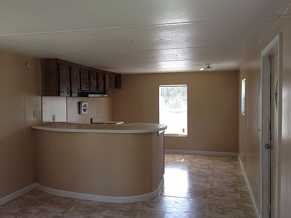Kitchen with breakfast area for table