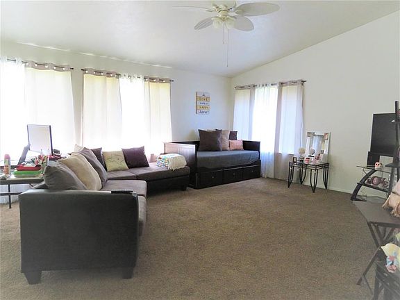 Large Living room directly in front of you as you enter. You can see all the way through to the back yard.