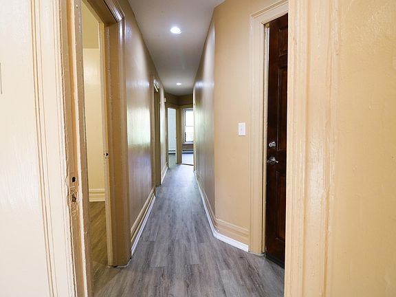 Hallway to access all 3 bedrooms & walk-in closet